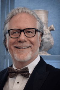 Tom Levine of Native Angelino Real Estate wearing a formal tuxedo.